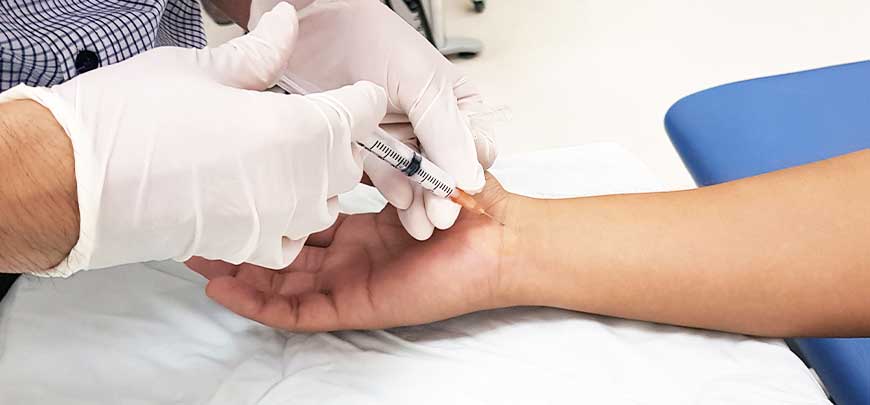 patient receiving Cortisone Injections to relieve joint pain